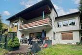 1. Ansicht - Waldnaher Wohntraum mit Entwicklungschancen - leerstehendes Einfamilienhaus in Hagen