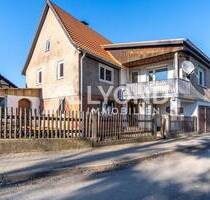 Ländlich gelegenes Einfamilienhaus mit 140 m² Wohnfläche und Garage - Osthausen-Wülfershausen