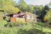 Hausansicht Garten - Unvergessliche Momente: Ihr Wochenendhaus schenkt Ihnen atemberaubende Sonnenuntergänge