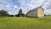 Gebäudeansicht - Mehrfamilienhaus, Wohnhaus mit 329,30 m&sup2; in Leizen zum Kaufen