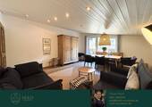 Wohnzimmer - Bergzauber genießen: 3-Zimmer-Ferienwohnung in den Bergen
