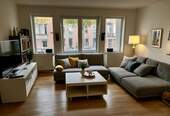 Wohnzimmer - Stilvolle 1-Zimmer-Wohnung mit Küche, Balkon & TG-Stellplatz - Provisionsfrei