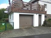Garage mit darüberliegende Terrasse und KG -Nebeneingang - 