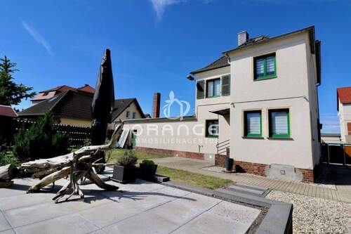 Rückansicht mit Terrasse - 4 Zimmer Einfamilienhaus zum Kaufen in Leipzig / Knauthain
