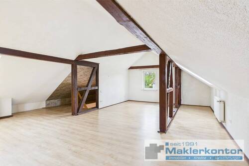 Dachgeschoss/Wohnbereich mit Kamin - 