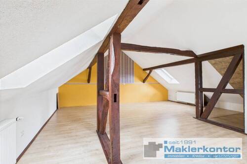 Dachgeschoss/Wohnbereich mit Kamin - 