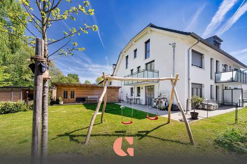 Außenansicht - Ca. 400 m² Privatgarten! - Traumhafte Erdgeschosswohnung