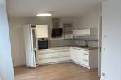 Wohnzimmer mit offener Küche - Etagenwohnung mit 67,00 m&sup2; in Grömitz zum Kaufen