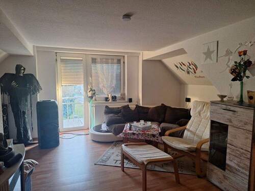 Wohnzimmer - 6 Zimmer Einfamilienhaus zum Kaufen in Friedland