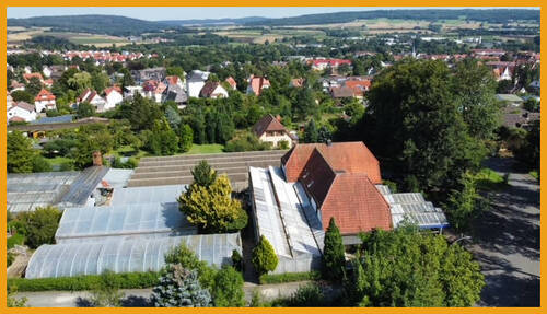 Seitenansicht - Mehrfamilienhaus, Wohnhaus mit 240,00 m² in Alsfeld zum Kaufen