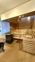 Sauna mit Glasfront und Holz - 