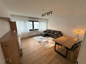 Wohnzimmer - 2 Zimmer Etagenwohnung zur Miete in Wilhelmshaven