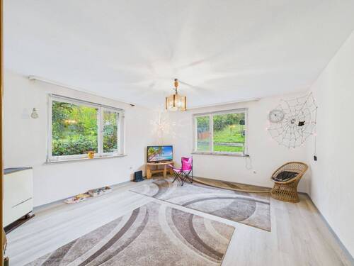 Wohnzimmer 1 - 1.OG - Mehrfamilienhaus, Wohnhaus mit 130,00 m&sup2; in Sulz am Neckar zum Kaufen