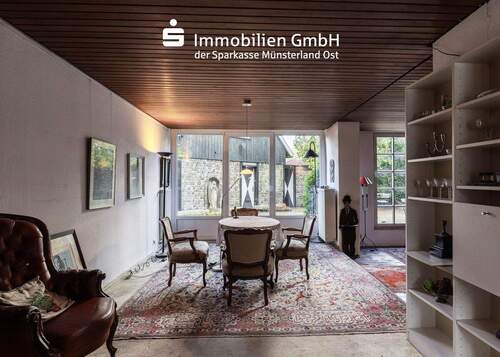 Wohnzimmer - 7 Zimmer Einfamilienhaus zum Kaufen in Münster