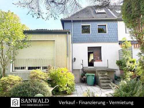 Bild 1 - Doppelhaushälfte mit großem Garten und viel Potenzial