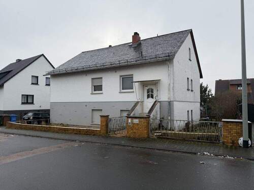 Titelbild - Freistehendes Einfamilienhaus mit Garage in Hünfelden - Mensfelden