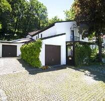 :TSC IMMOBILIEN | GAUTING | FREISTEHENDES EINFAMILIENHAUS IN BESONDERER ARCHITEKTUR