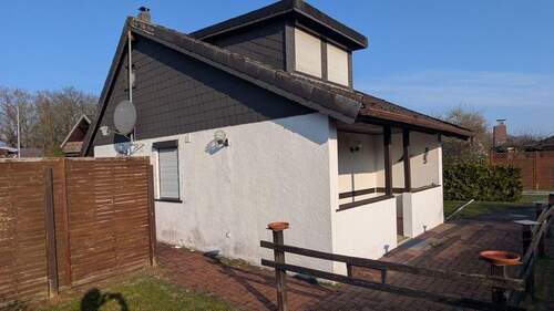 Ansicht - 3 Zimmer Mehrfamilienhaus, Wohnhaus in Zetel