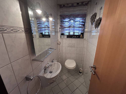 Gäste-WC - Einfamilienhaus mit 131,60 m&sup2; in Hude (Oldenburg) zum Kaufen