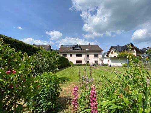 Rückansicht mit Garten - 1 Zimmer Einfamilienhaus in Dahlem