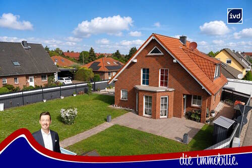 Titel - Einziehen und wohlfühlen: Familienfreundliches Haus mit Garten, Terrasse und Carport