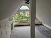 Zimmer im Dachgeschoss - 