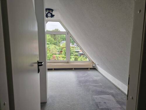 Zimmer im Dachgeschoss - 