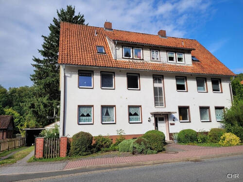 Vorderansicht - Sonnige 3-Zimmer Eigentumswohnung incl. Einbauküche