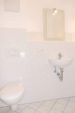 04-Gäste-WC - Etagenwohnung mit 100,00 m&sup2; in Lenggries zum Kaufen