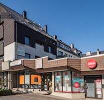 Interessante Gewerbeimmobilie mit zwei vermieteten Ladenlokalen in zentraler Lage von Meschede!