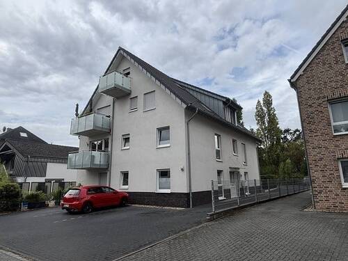 Front-+ Seitenansicht - 1 Zimmer Mehrfamilienhaus, Wohnhaus zum Kaufen in Oberhausen