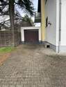 Garage mit Parkplatz - 