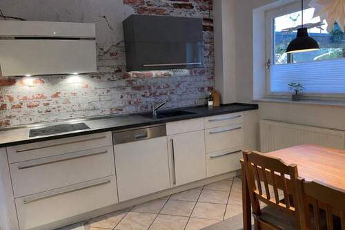 Küche mit Einbauküche - 5 Zimmer Reihenendhaus in Cambs / Brahlstorf