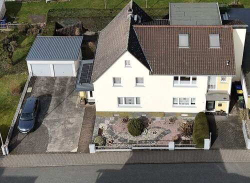 Bild 2 - 8 Zimmer Mehrfamilienhaus, Wohnhaus zum Kaufen in Lollar