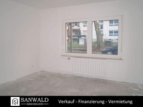 Bild 1 - 2,5 Zimmer Erdgeschosswohnung mit Balkon