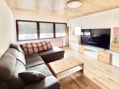 Wohnzimmer im Obergeschoss - 7 Zimmer Doppelhaushälfte zum Kaufen in Wannweil
