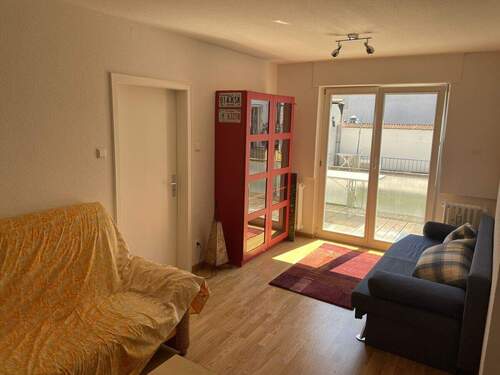 OG Wohnzimmer mit Ausgang zum Balkon - 