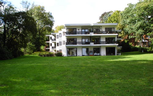 Gartenansicht - NEUER PREIS Traumwohnung mit Seeblick, Schwimmbad+Sauna & Bootsliegeplatz