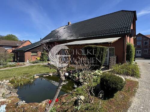 Garten mit Teich - 5 Zimmer Einfamilienhaus zum Kaufen in Bergen an der Dumme