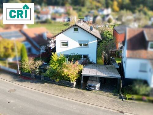 Außenansicht - Einfamilienhaus mit Einliegerwohnung und Garten in Wetter-Oberrosphe