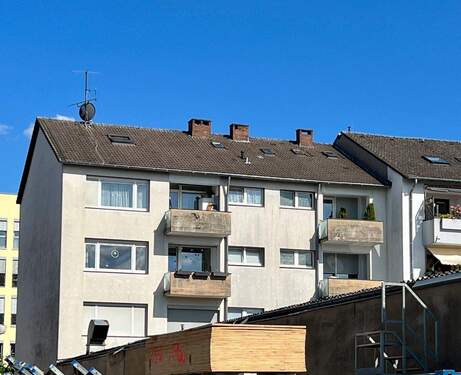 Rückansicht - Mehrfamilienhaus, Wohnhaus zum Kaufen in Langenfeld