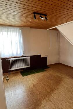 Zimmer im Dachgeschoss - 