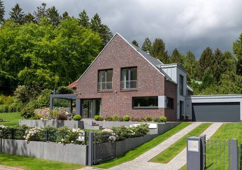 Zeitloses Design, perfekte Energieklasse - Begehrteste Wohnlage der Nordheide, eine Symbiose aus Design, Funktionalität und Naturverbundenheit.