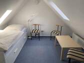 Schlafzimmer im ausgebauten Dachgeschoss - 