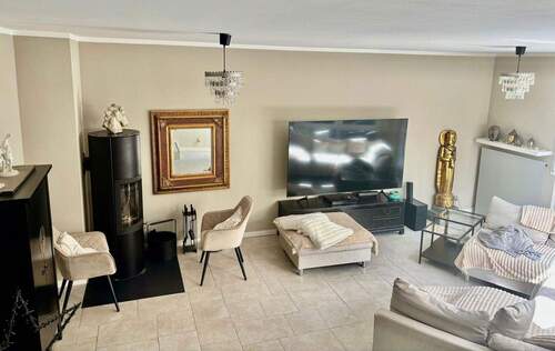 Wohnzimmer mit Ofen - 