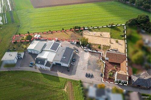 Luftbild (weiß Grundstück- rot angepachtet) - Einfamilienhaus in Niederkrüchten / Dam