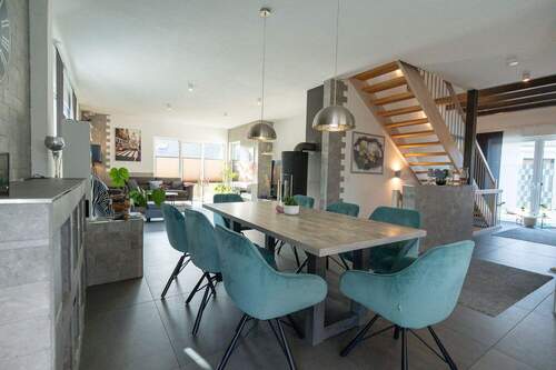 Esszimmer mit Blick in die Küche - Einfamilienhaus mit 178,00 m&sup2; in Melle zum Kaufen