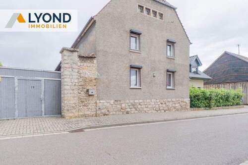 Straßenansicht 2 - Geräumiges Einfamilienhaus mit Einliegerwohnung