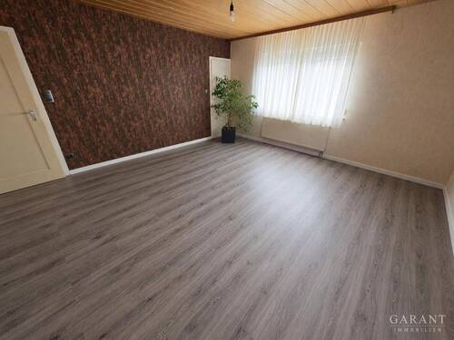 Wohnzimmer WHG 1.OG links - 