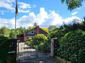 Zufahrt m. elektrischem Tor - Einfamilienhaus mit 159,00 m² in Barßel zum Kaufen